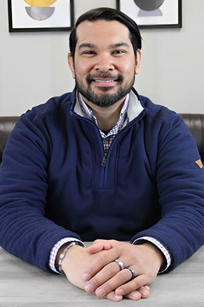 Professional headshot of Joe Serrano, Clara therapist